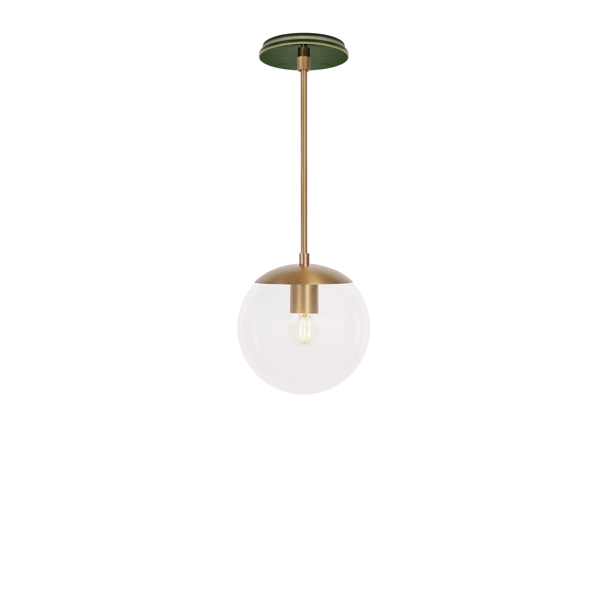 Alto Rod 8” Clear shown in Heirloom Brass with a Forest Green Star Ceramic Canopy