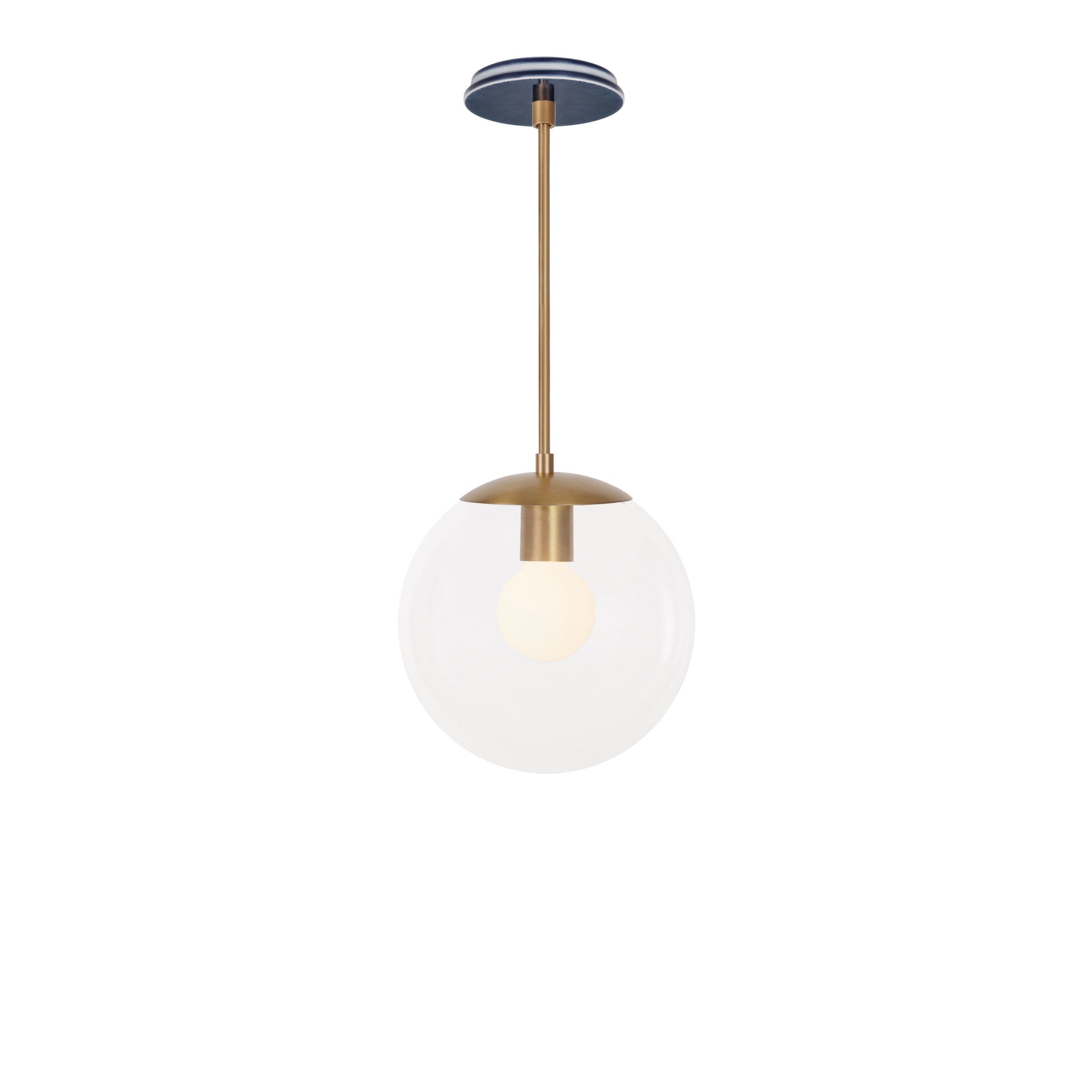 Alto Rod 10” Clear shown in Heirloom Brass with an Indigo Blue Star Ceramic Canopy