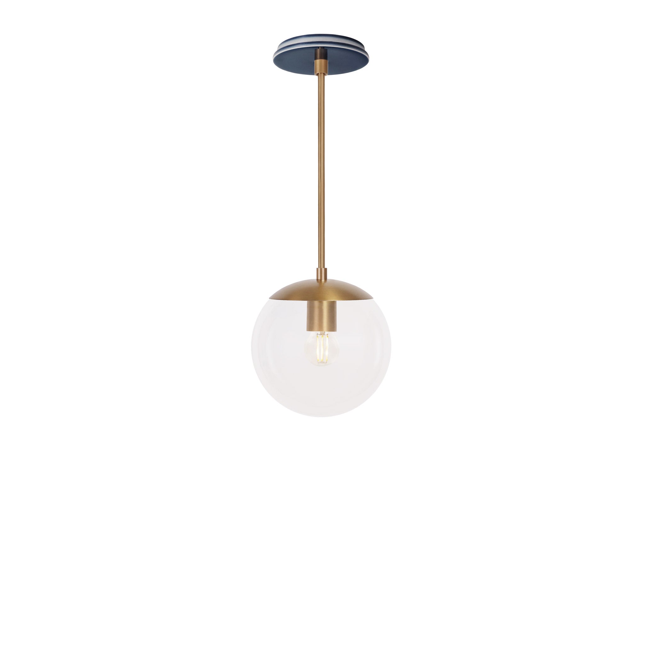 Alto Rod 8” Clear shown in Heirloom Brass with an Indigo Blue Swift Ceramic Canopy