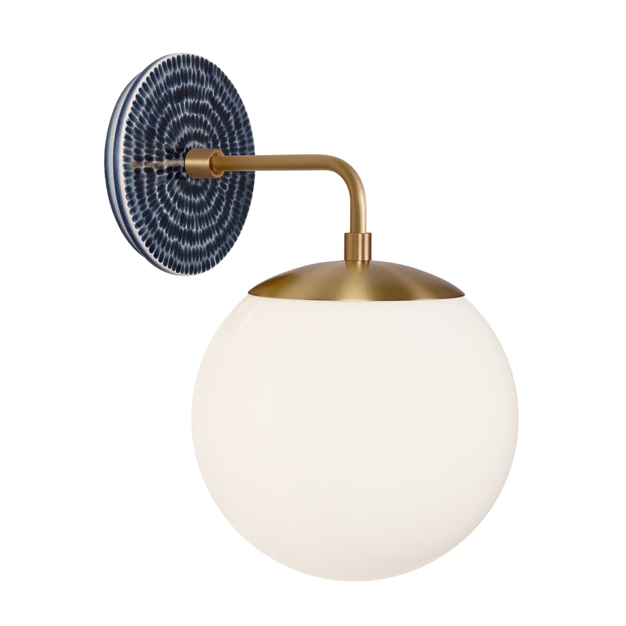 Alto Sconce 8” shown in Heirloom Brass with an Indigo Blue Sunflower Ceramic Canopy