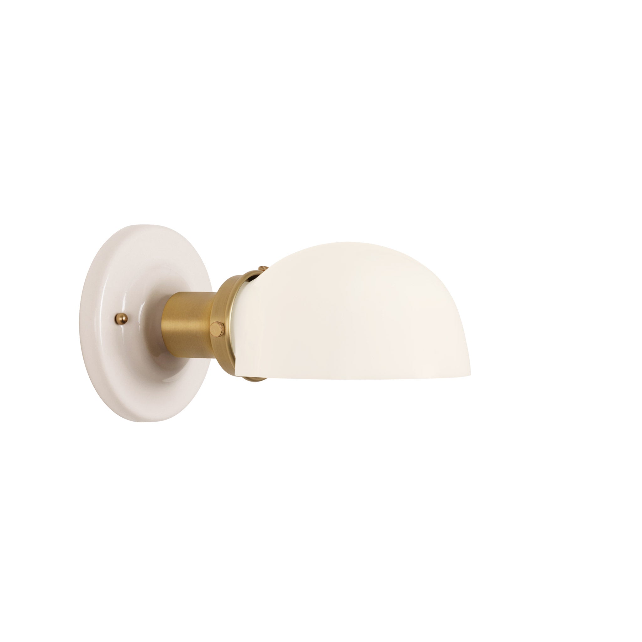 Archie Single shown in Heirloom Brass with a Gloss White Ceramic Canopy