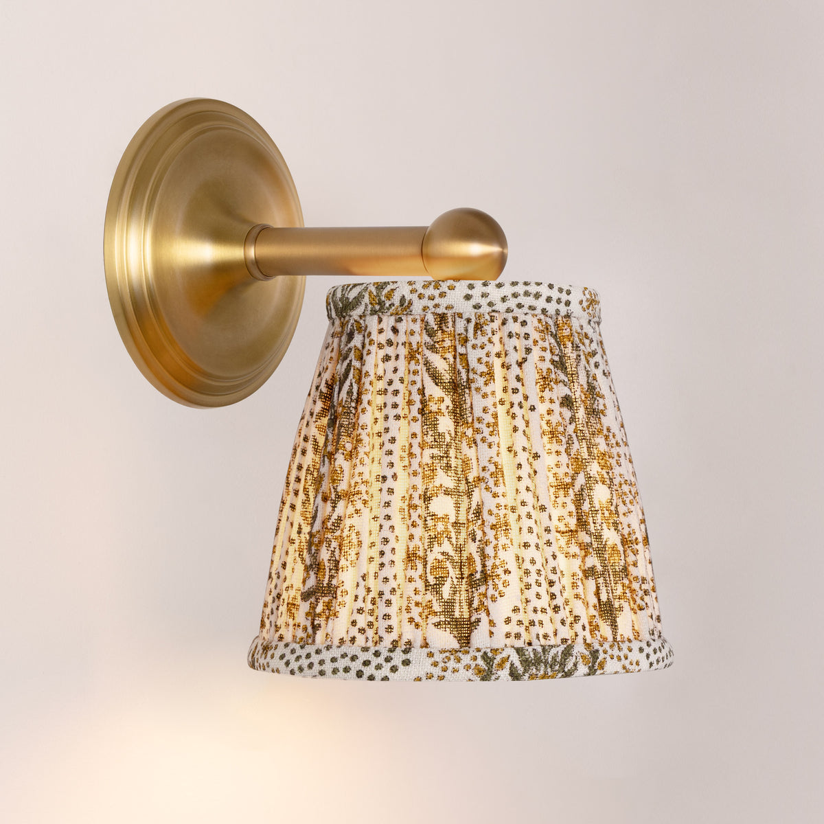 Cambridge Sconce shown in Heirloom Brass with a Winfleur Mustard Shade