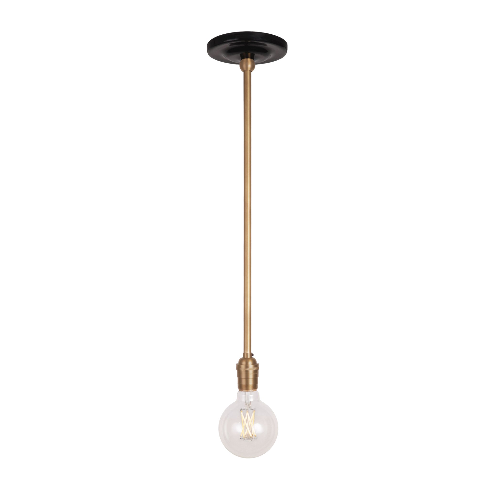 Grace Rod Pendant shown in Heirloom Brass with a Gloss Black Ceramic canopy