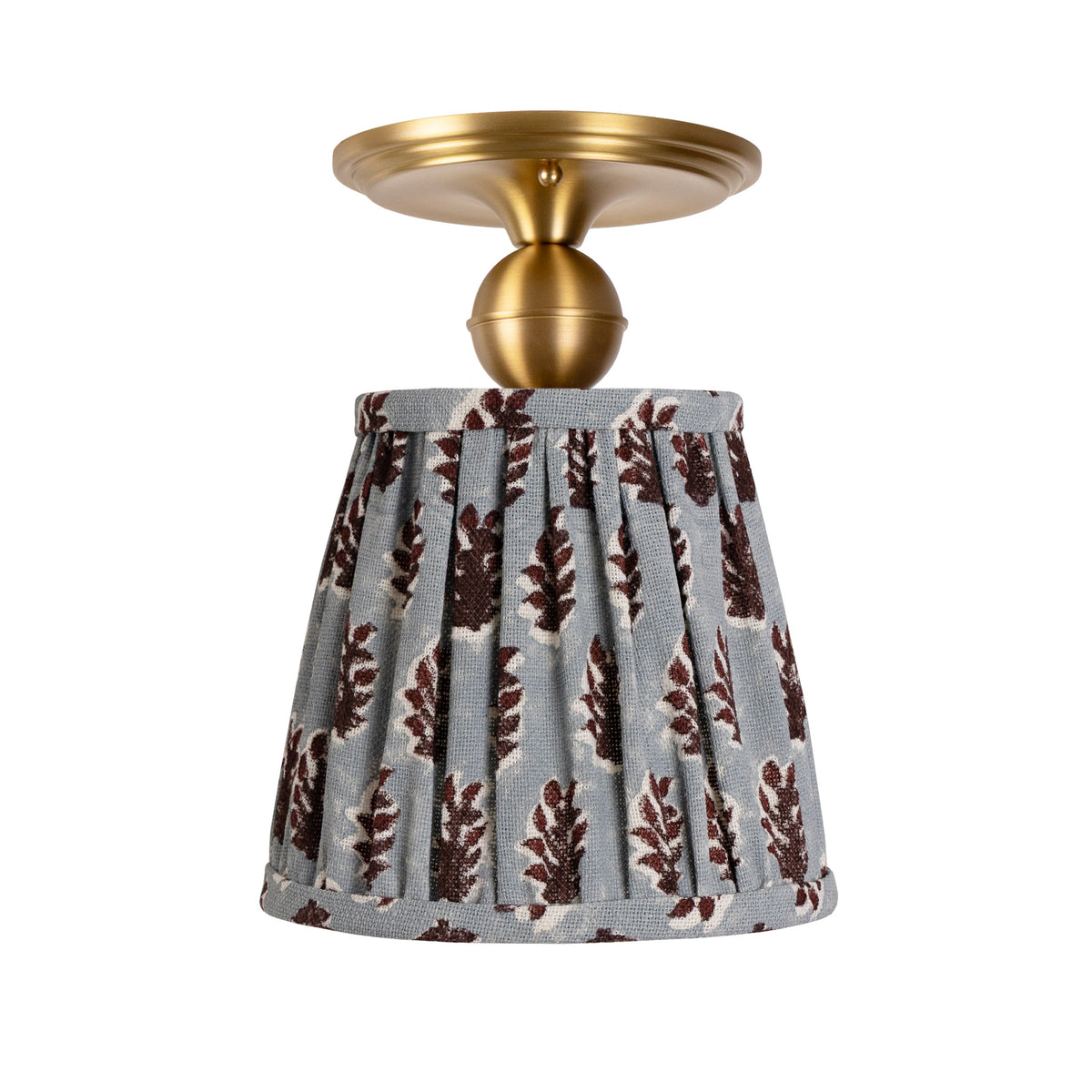 Oxford Surface shown in Heirloom Brass with a Trulli Auburn Shade