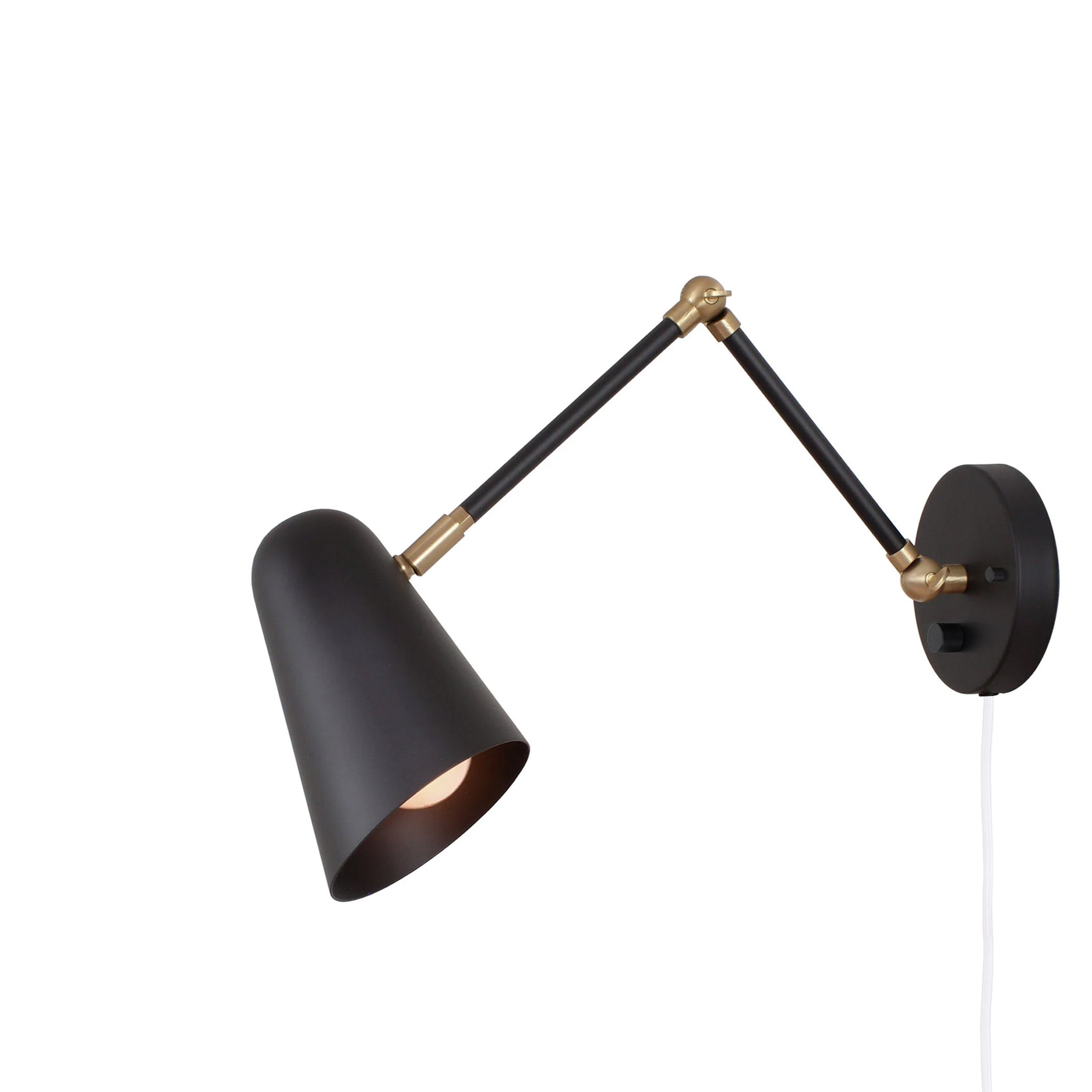 Wildwood Double Articulated shown in Matte Black with Brass Accents, a White Cord and Backplate Dimmer Switch