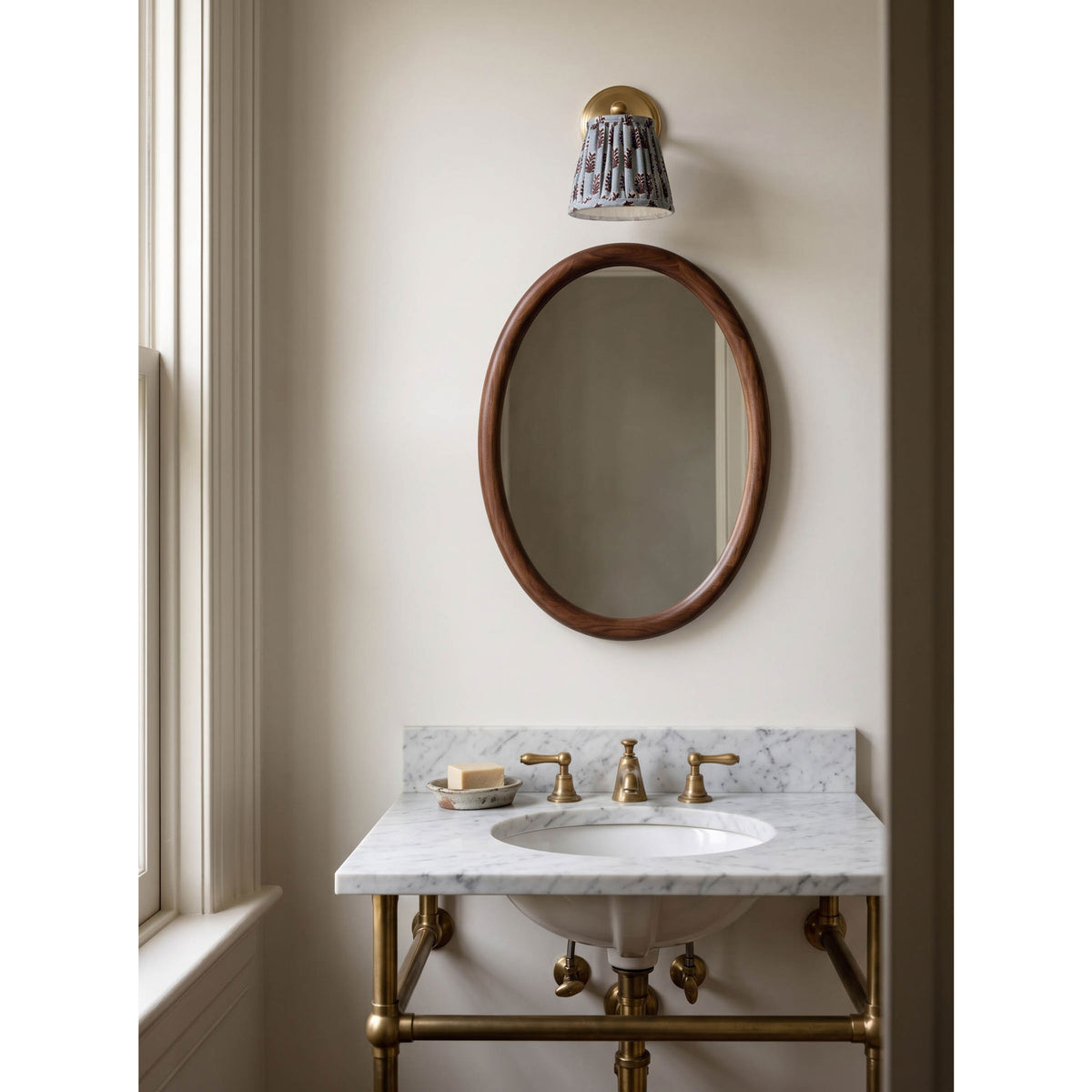 Cambridge Sconce shown in Heirloom Brass with a Trulli Auburn Shade
