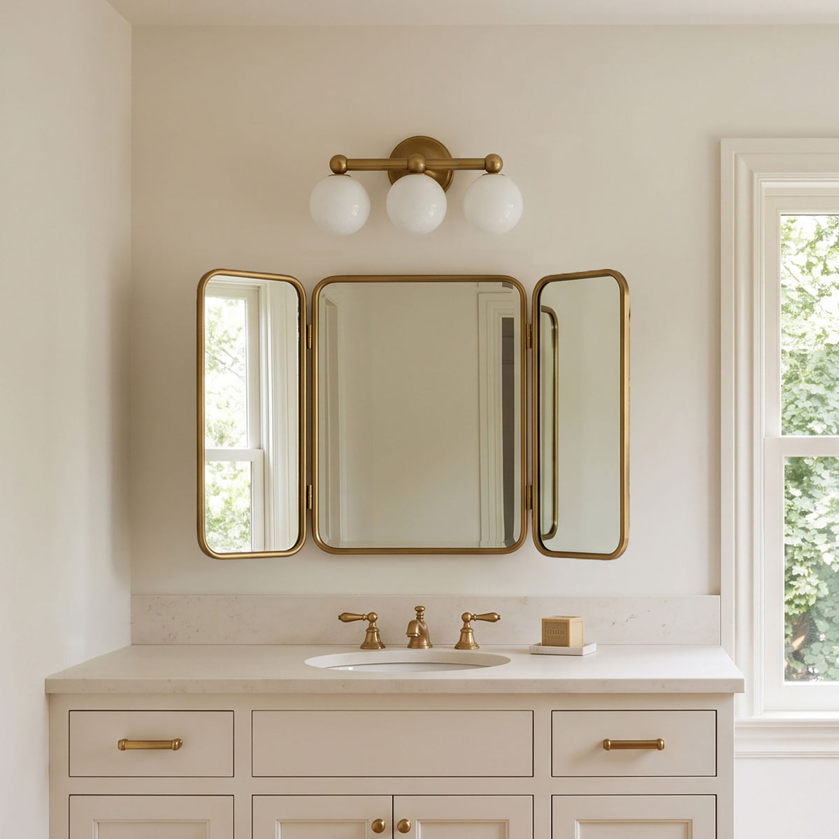Eleanor Triple shown in Heirloom Brass
