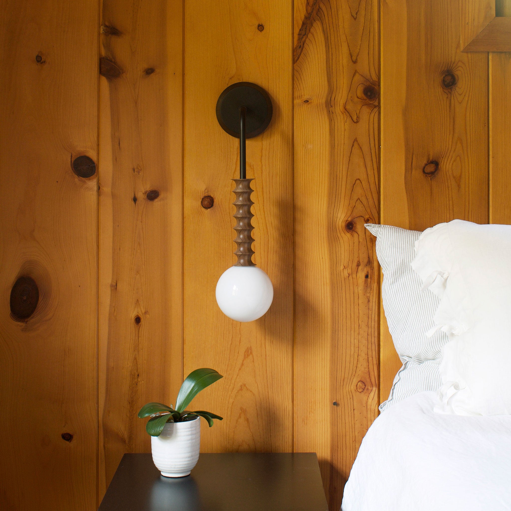 Joslyn shown in Walnut with Matte Black and a Black Stained canopy