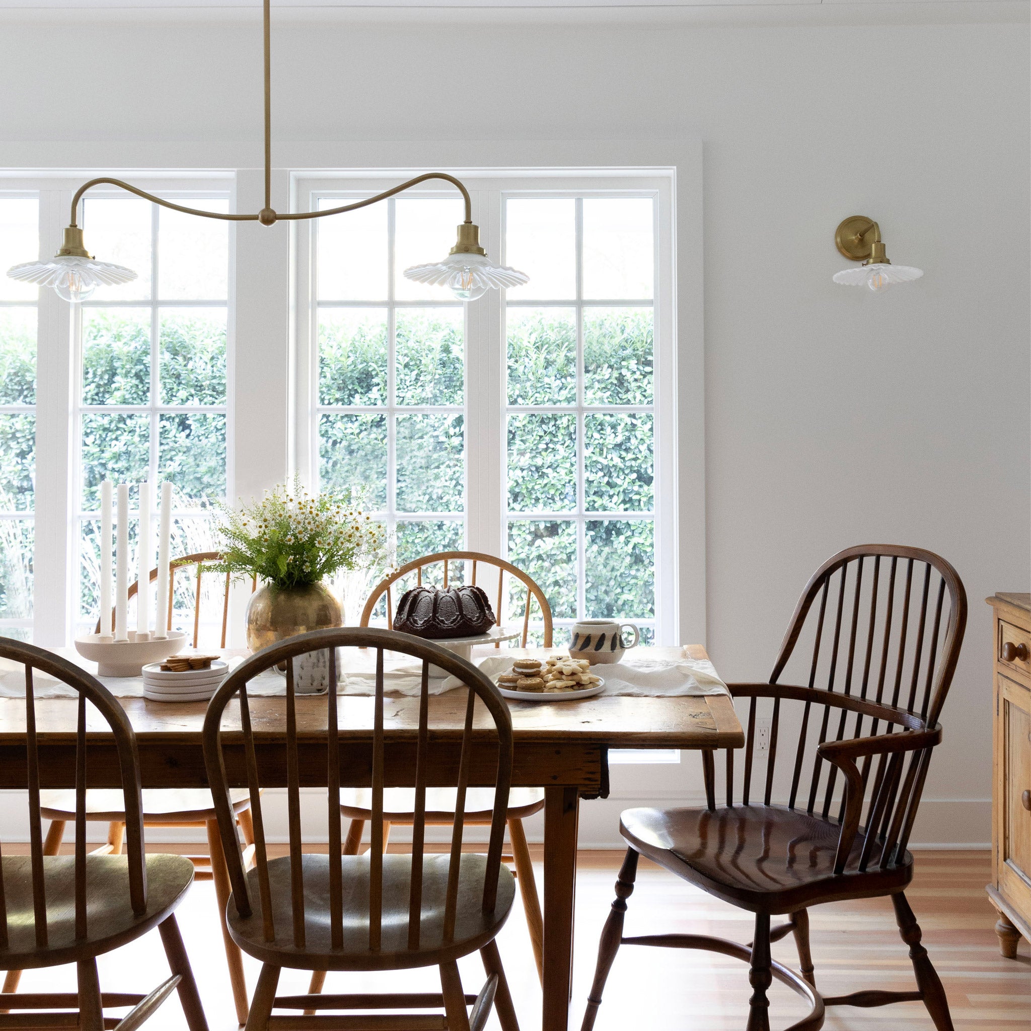 Marjorie Demi Sconce and Marjorie Grand Double Pendant in Heirloom Brass
