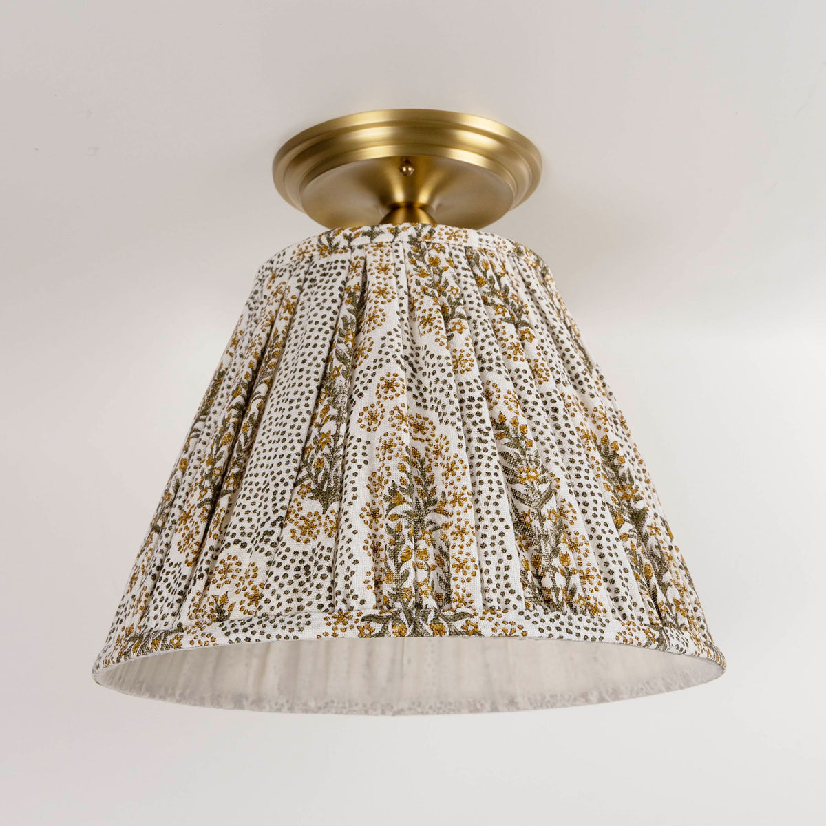 Oxford Surface shown in Heirloom Brass with a Winfleur Mustard Shade