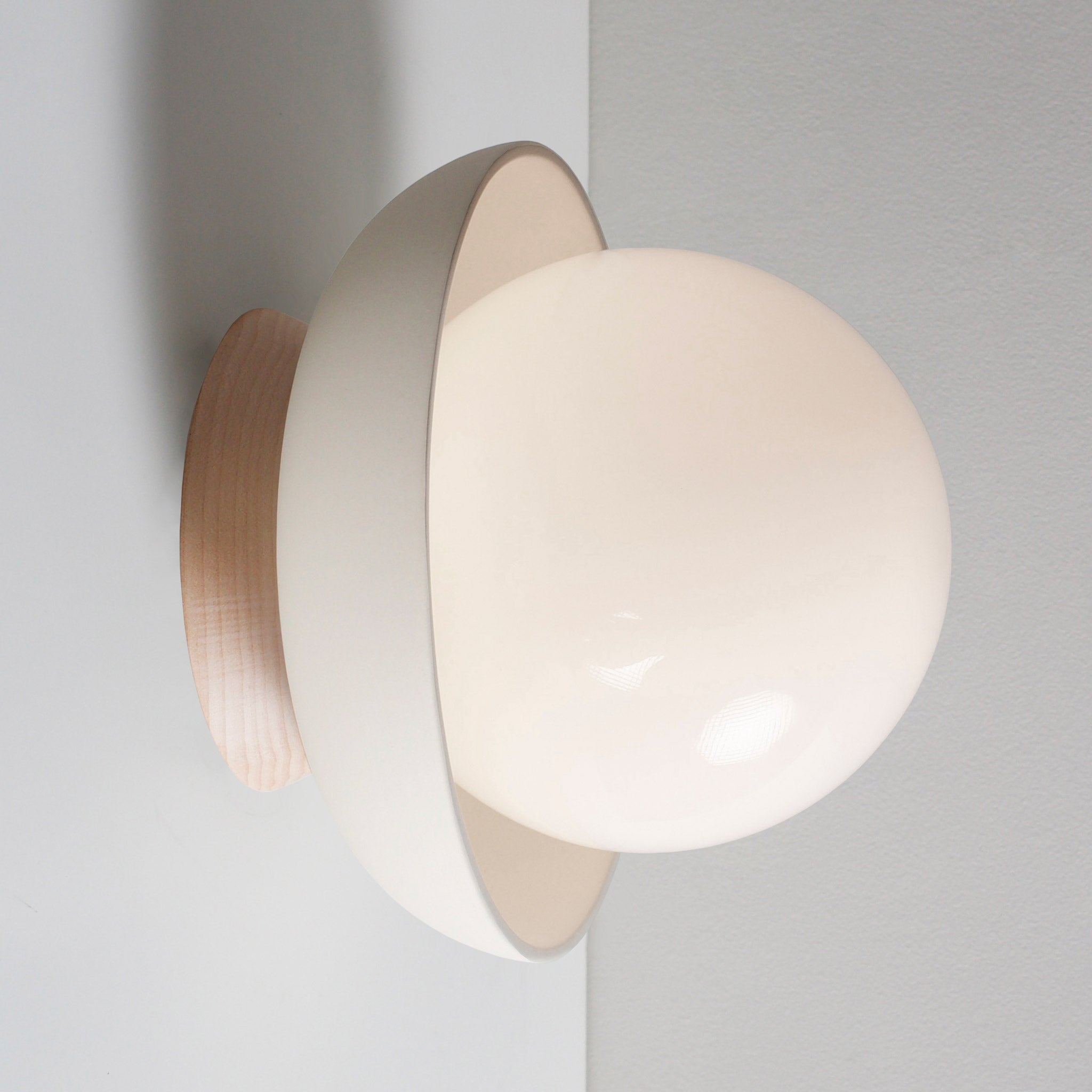 Terra Lexi shown in Bone ceramic and Maple wood canopy