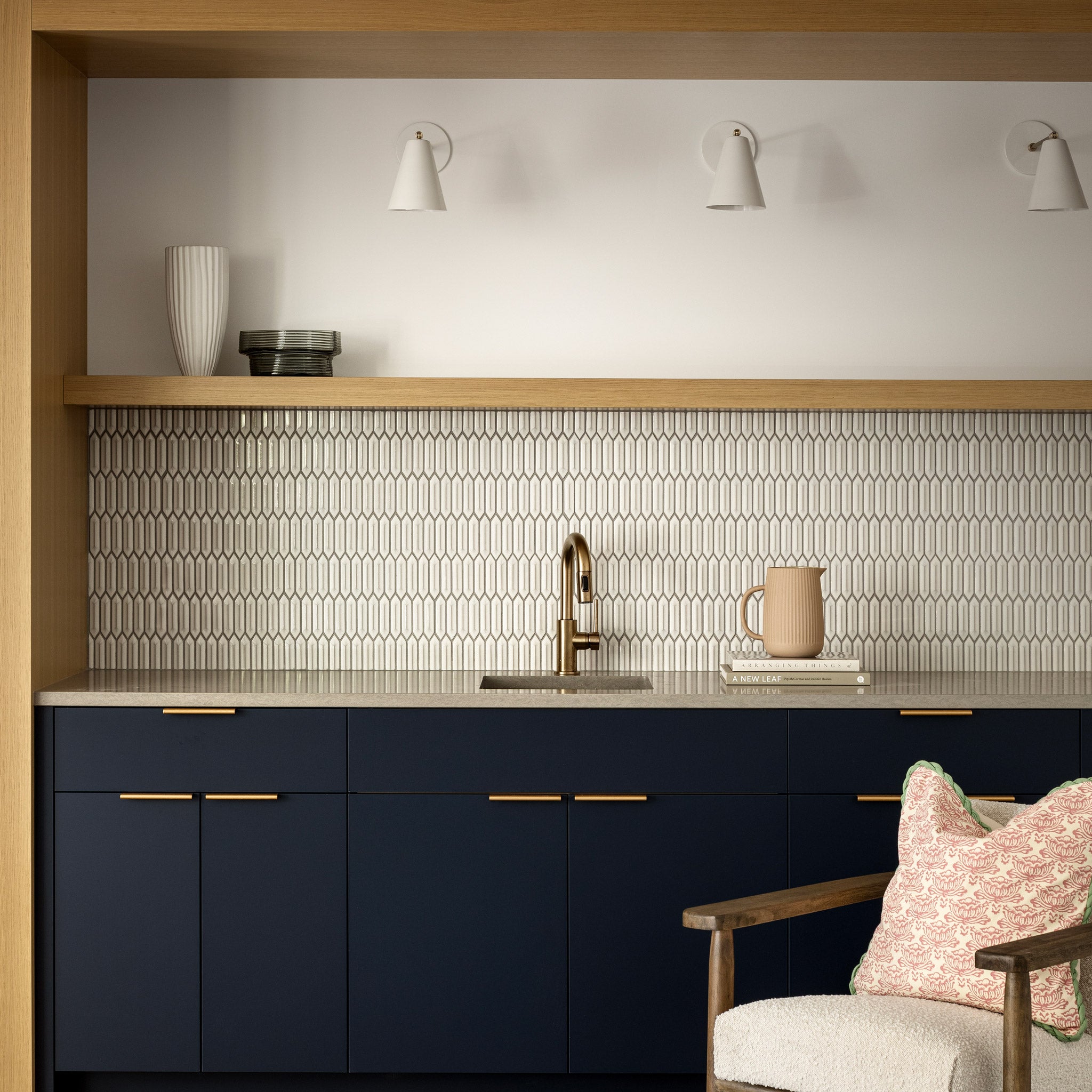 Tilt Cone shown in White and Brass. Interior design by Alykhan Velji Design