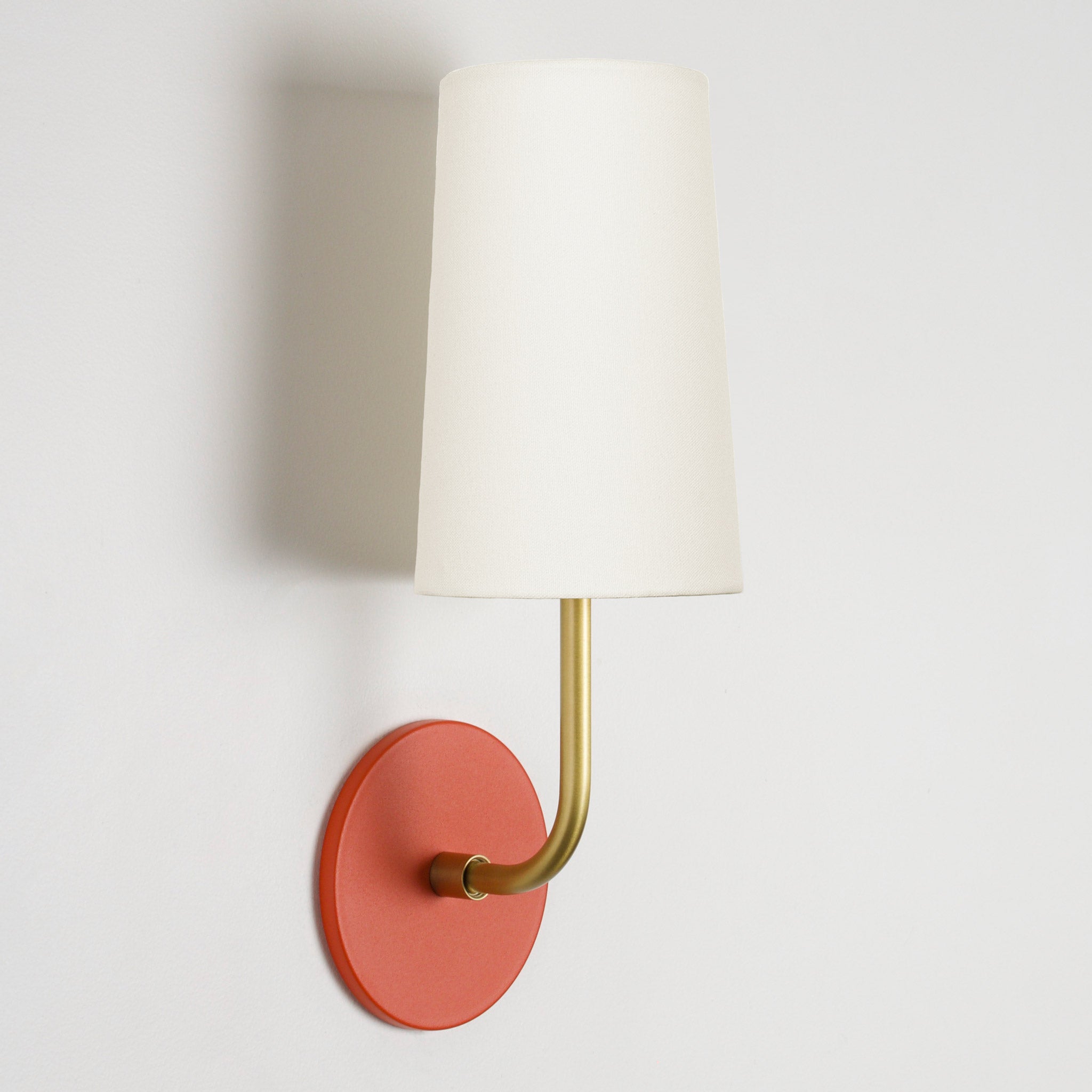 Timberline Linen shown with a Brass arm and Persimmon canopy