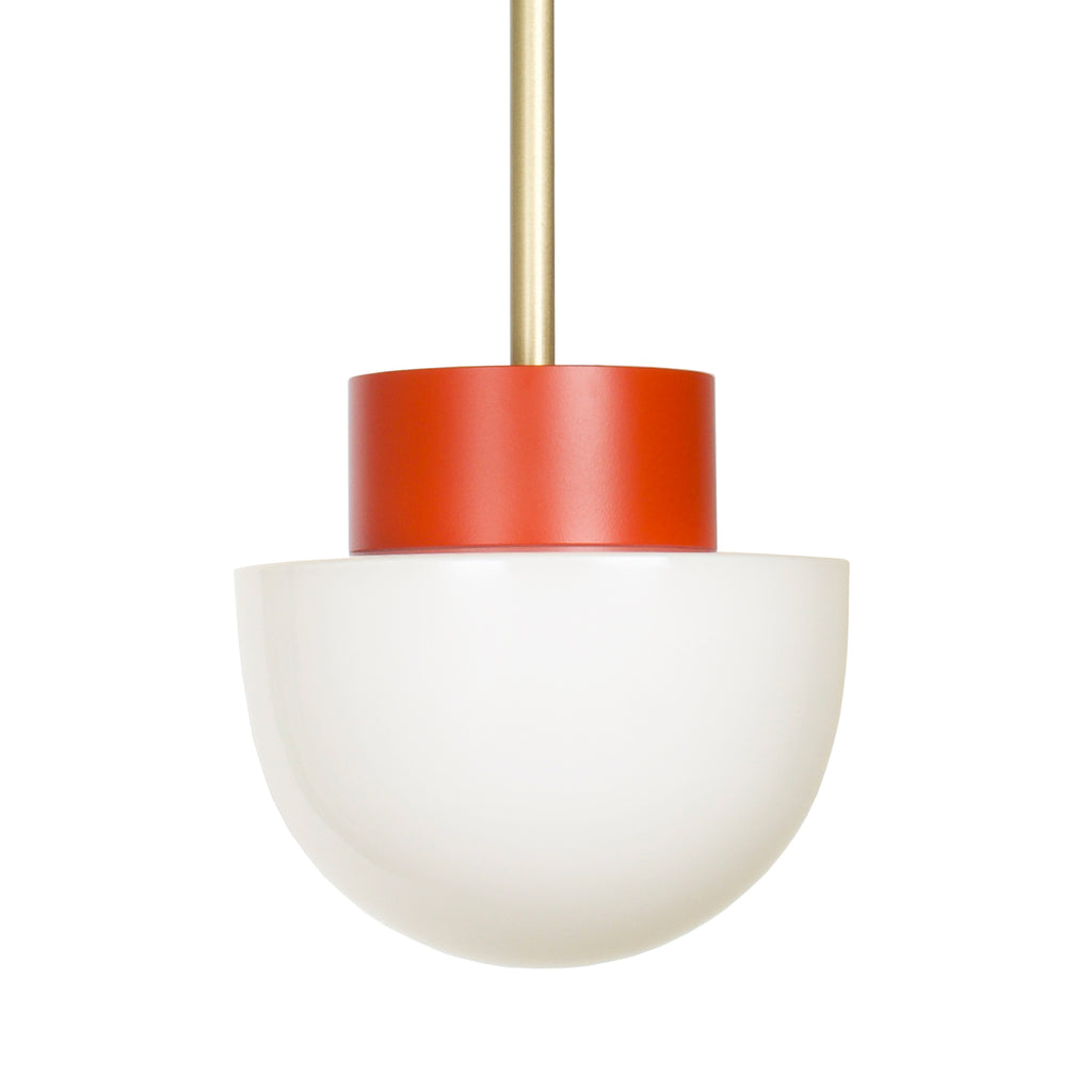 Anni pendant shown with a brass rod and a persimmon shade holder finish.