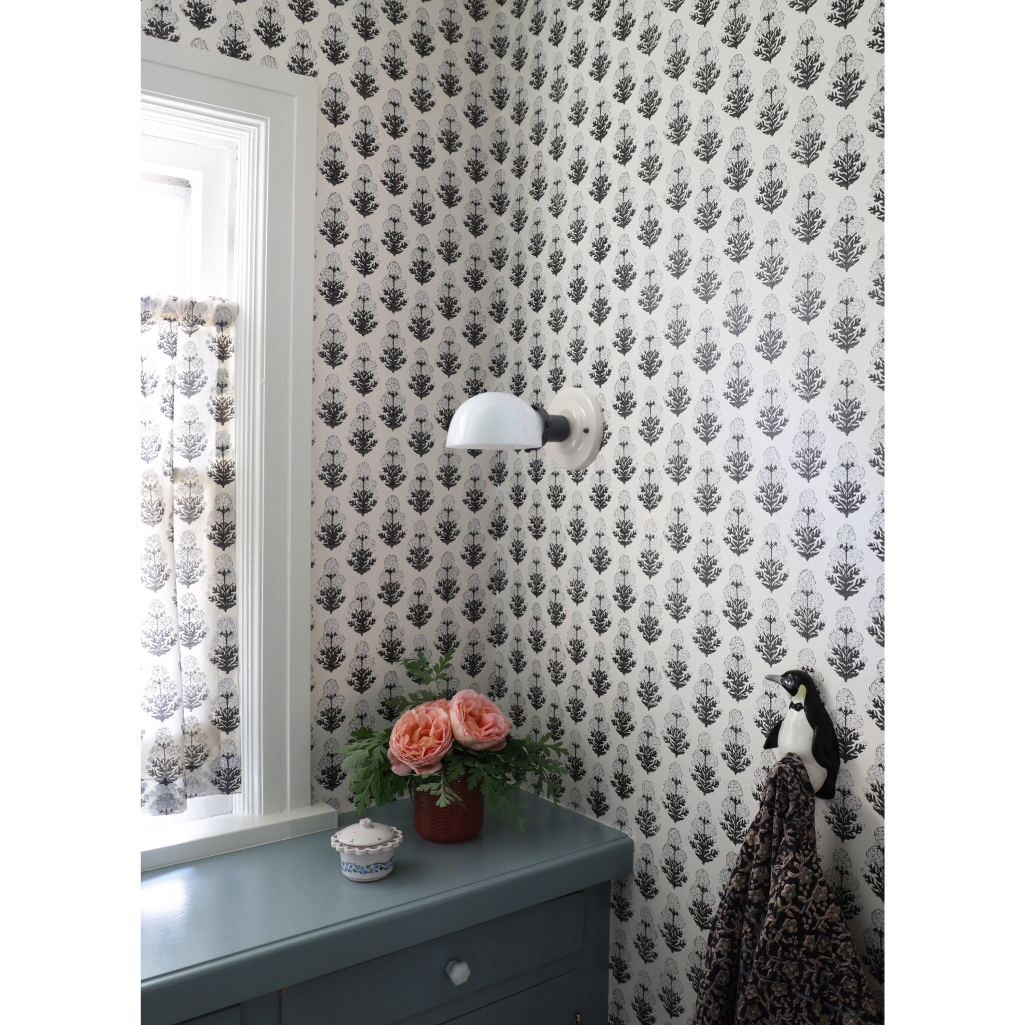 Archie Single shown in Graphite Patina with a Gloss White Ceramic Canopy shown with Marigold wallpaper and fabric from Filling Spaces