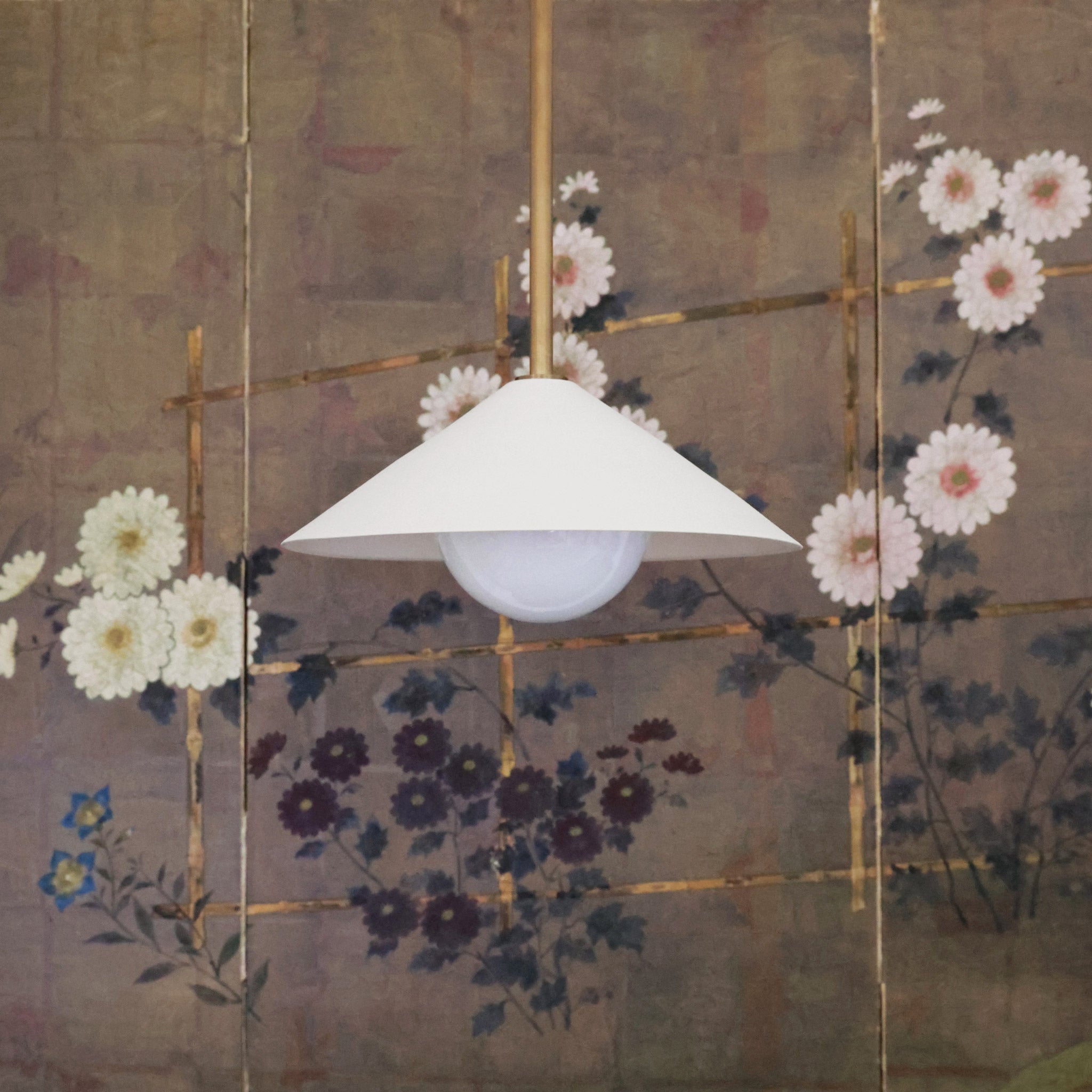 Elvia Pendant shown in Bone Ceramic and Heirloom Brass