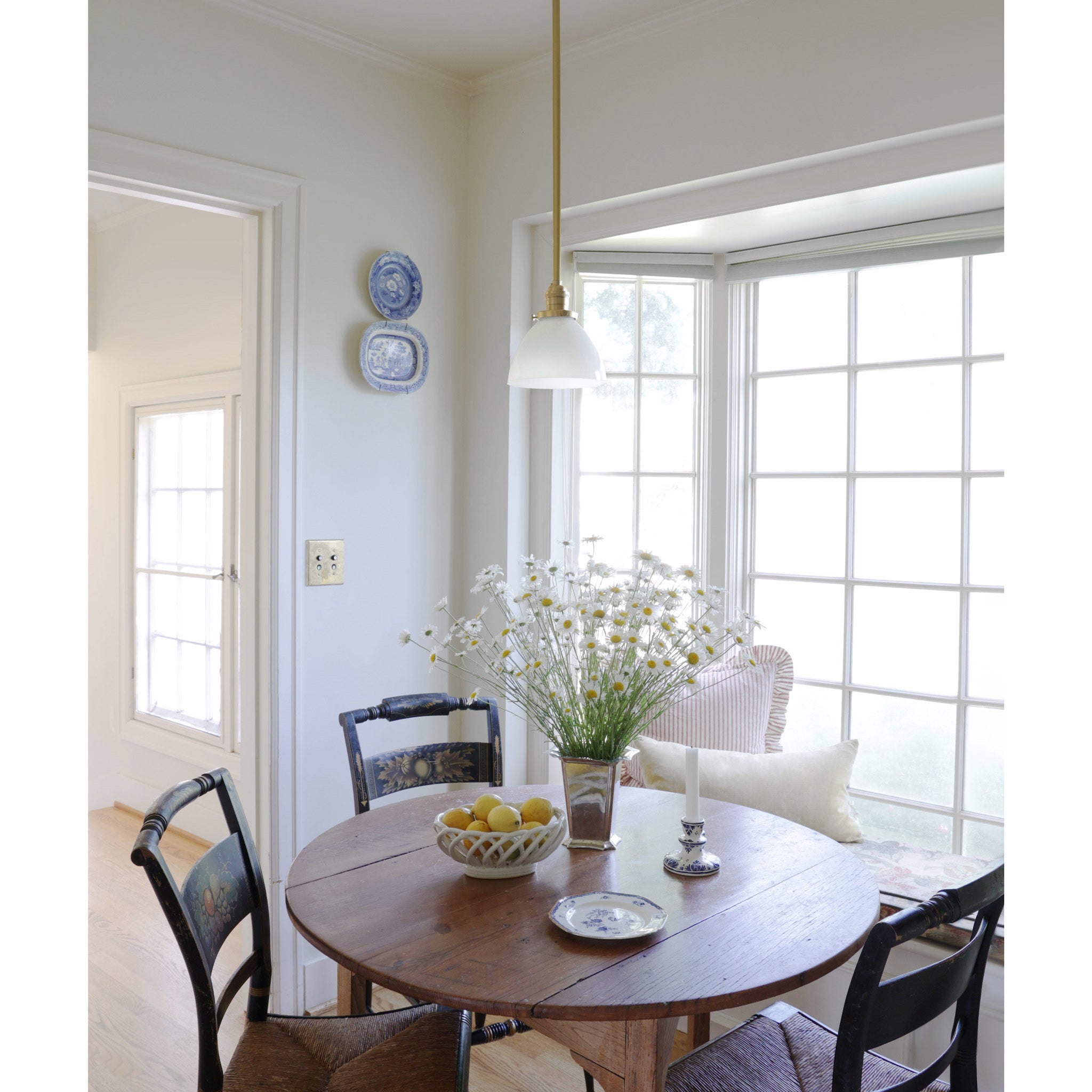 Grace Rod Pendant shown in Brass. Interior design by Sarah J. Meyer Design