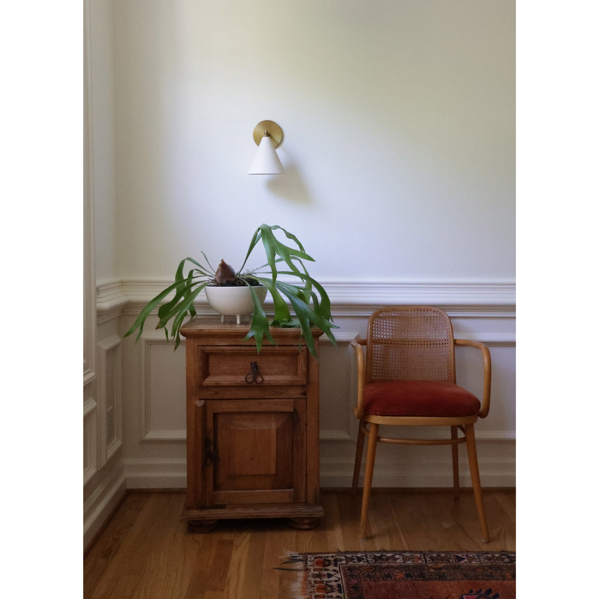 Petra Ceramic Sconce Shown in Heirloom Brass with a 3" Rod