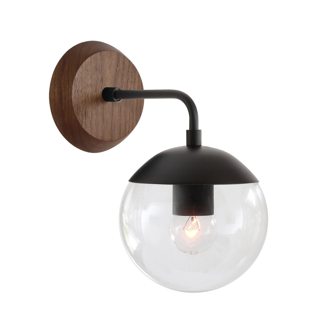 Alto Sconce 6" with Wood Canopy shown in Matte Black and Walnut canopy with a Clear 6" globe.