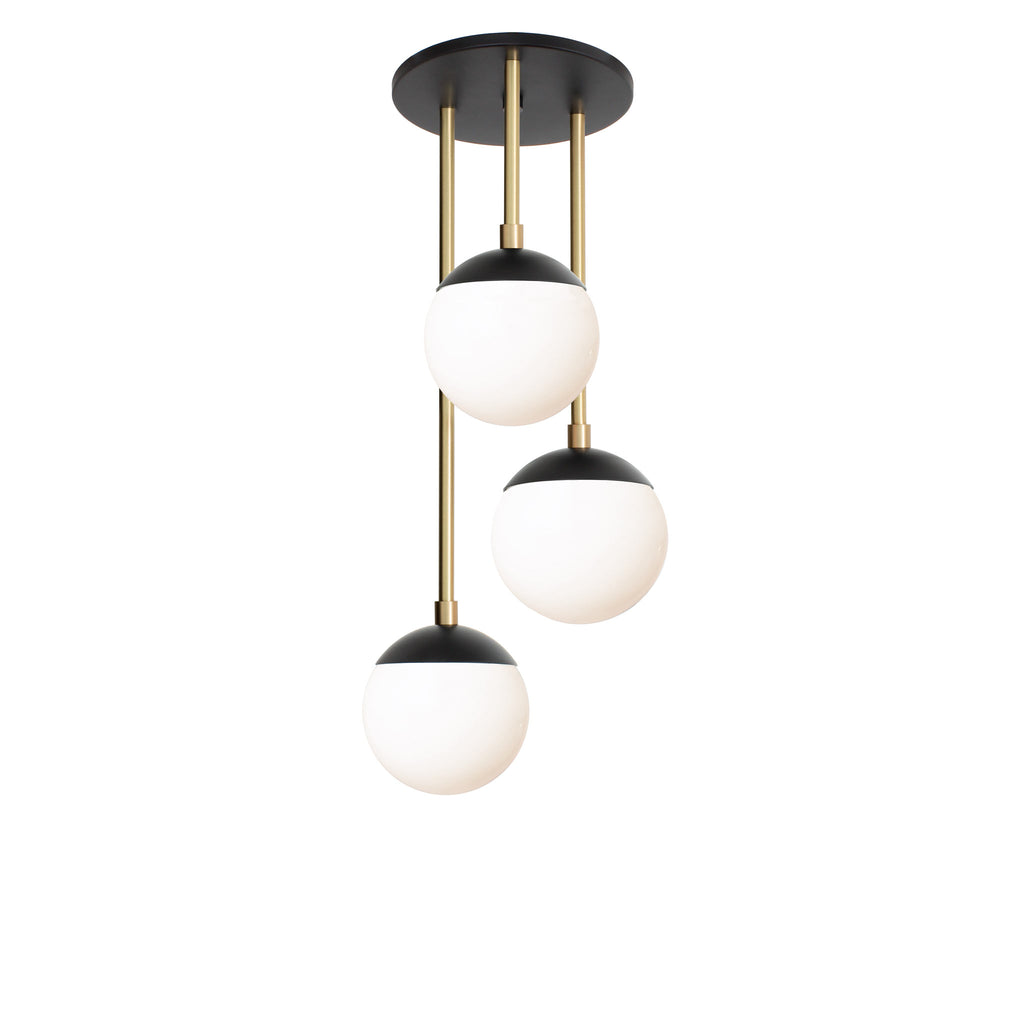 Alto Waterfall shown in Matte Black and Brass with Opal 6" globes.