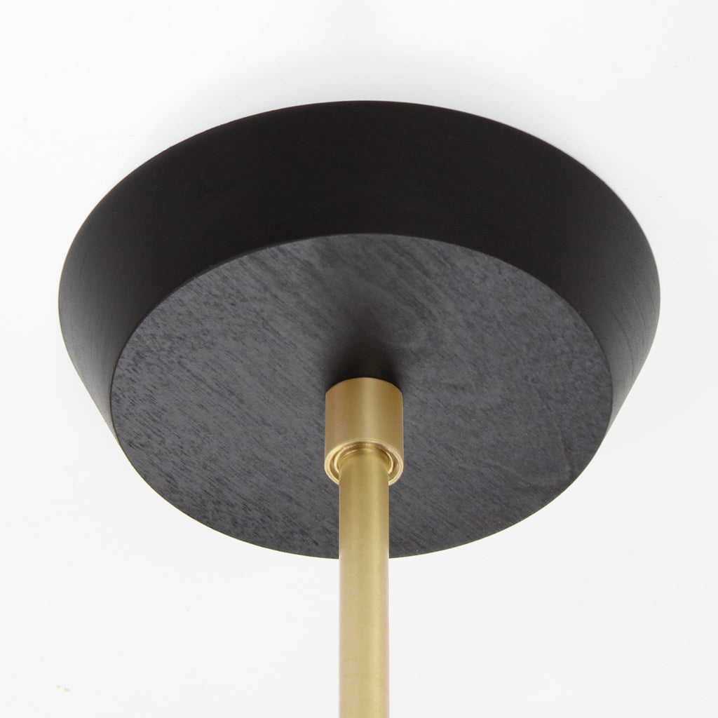 Mounting canopy shown in Black Stained wood finish with Brass rod.
