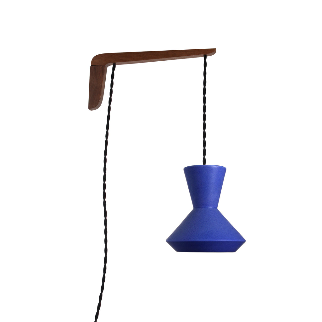 Bobbie Swing shown in Cobalt Blue Glaze with Walnut wood and Black Twist cord.