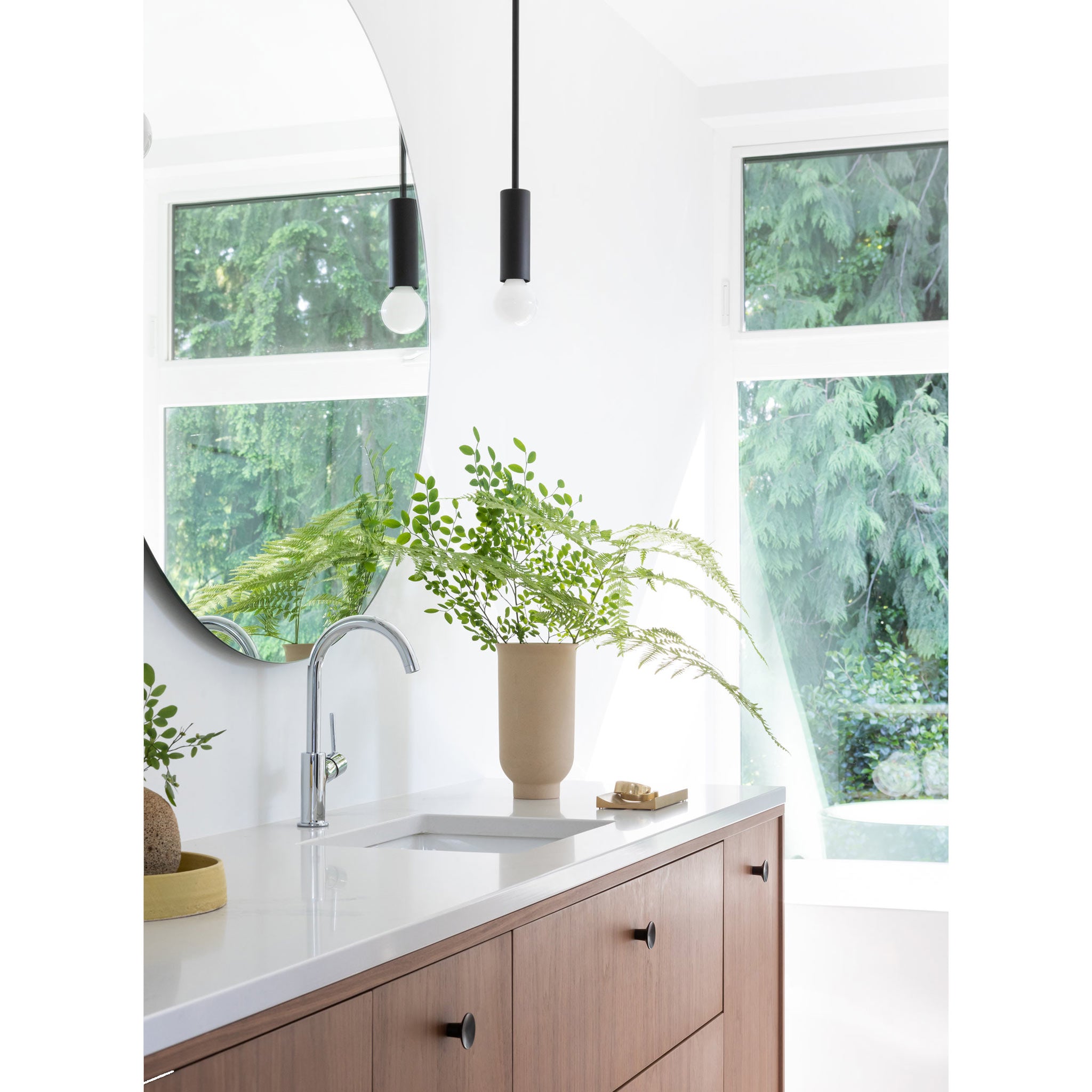 Fjord Rod Pendant shown in Matte Black. Interior design by Sophie Burke Design. Photo by Ema Peters
