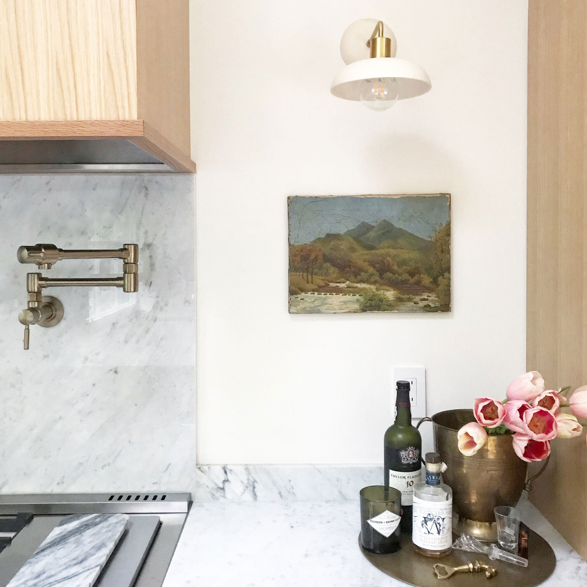 Terra Sconce shown in Bone ceramic finish with Brass metal, Interior Design by Ivy House Designs for Pigeon Hole Home Store