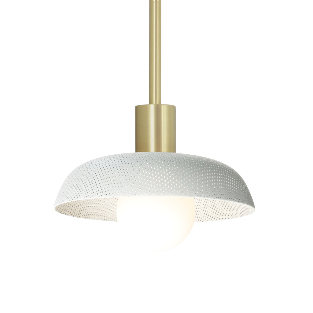 Sally Pendant for Vaulted Ceiling shown with a White perforated shade and Brass fixture finish.