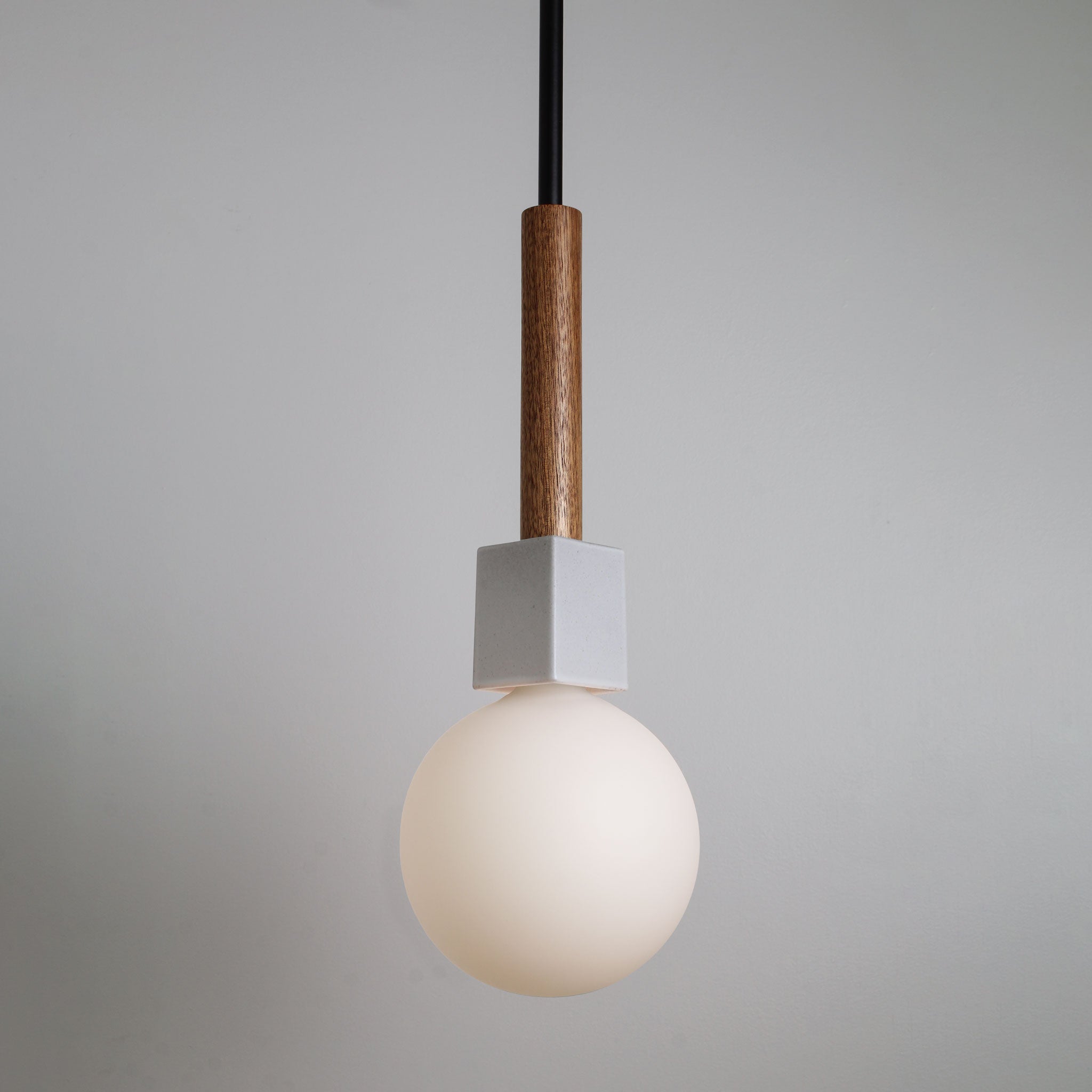 Seneca Pendant shown in Walnut with Matte Black