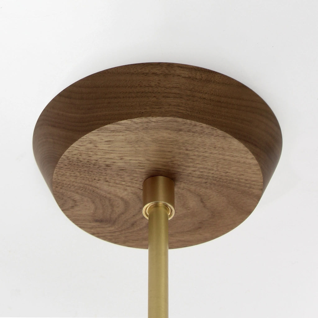 Mounting canopy shown in Walnut with Brass rod.