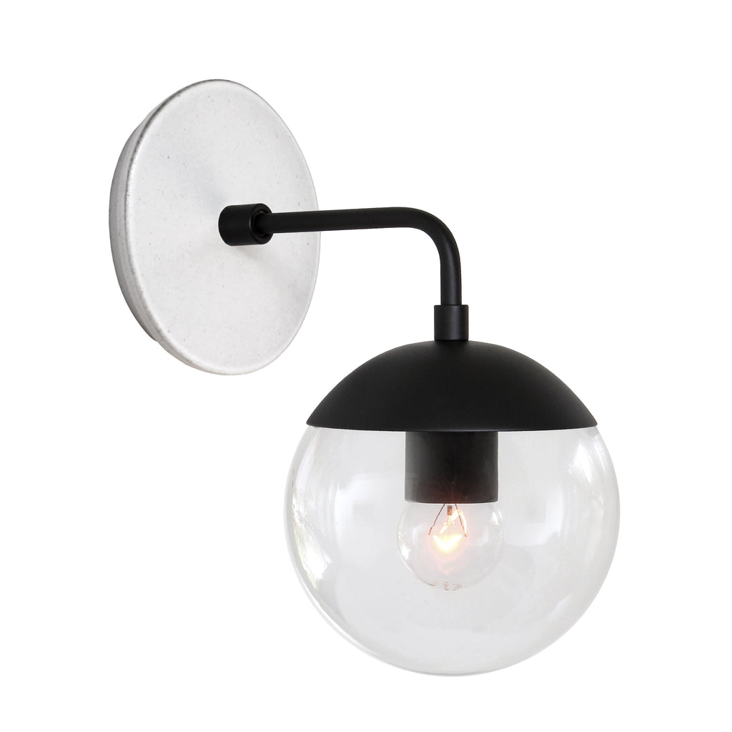 Alto Sconce 6" with Ceramic Canopy shown in Matte Black with a Brownstone White Swift Ceramic Canopy Pattern and a Clear 6" globe.