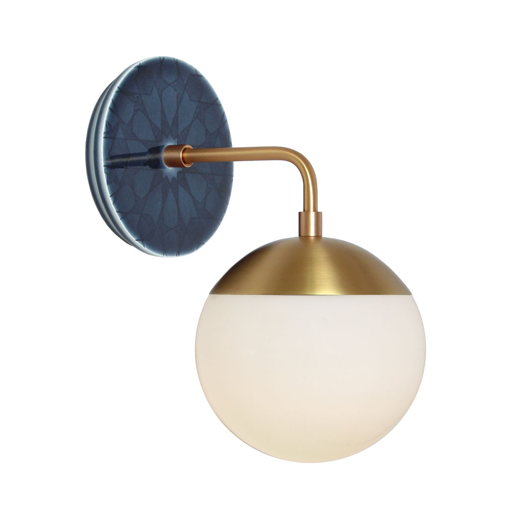 Alto Sconce 6" with Ceramic Canopy shown in Brass with an Indigo Blue Star Ceramic Canopy Pattern and an Opal 6" globe.