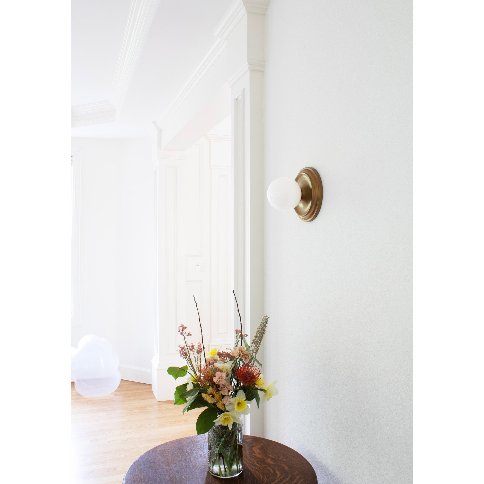 Brigette Sconce shown in Heirloom Brass