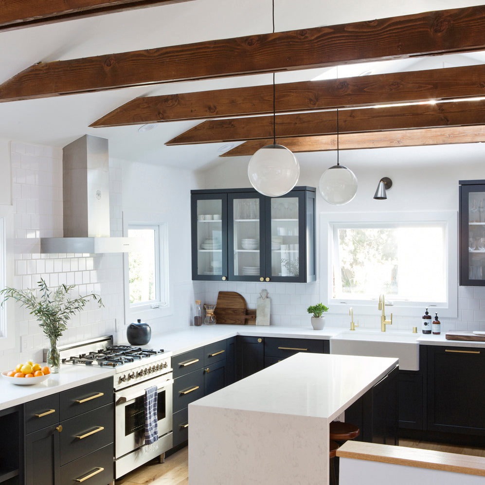Tilt Cone shown in Graphite Patina with Brass. Interior design by Carly Waters. Photo by Vivian Johnson