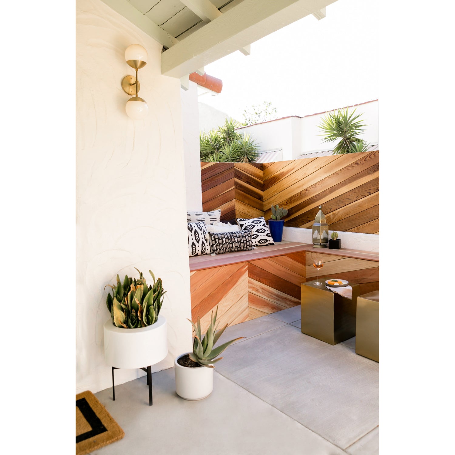 Theo shown in Brass with Opal 6" globes. Interior design by Jaclyn Johnson. Photo by Monica Wang