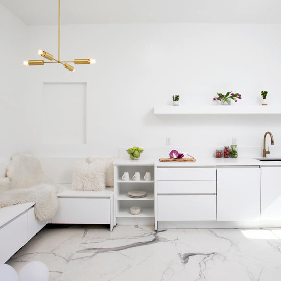 Fjord Compass for Vaulted Ceiling shown in Brass. Interior design by Gloria Sanchez. Photo by Kiritin Beyer