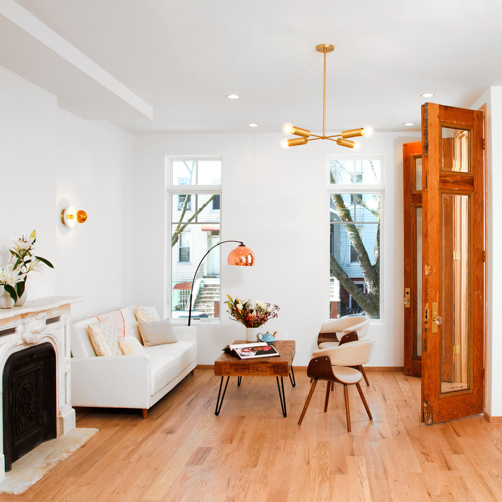 Fjord Compass for Vaulted Ceiling shown in Brass. Interior design by Gloria Sanchez. Photo by Kiritin Beyer