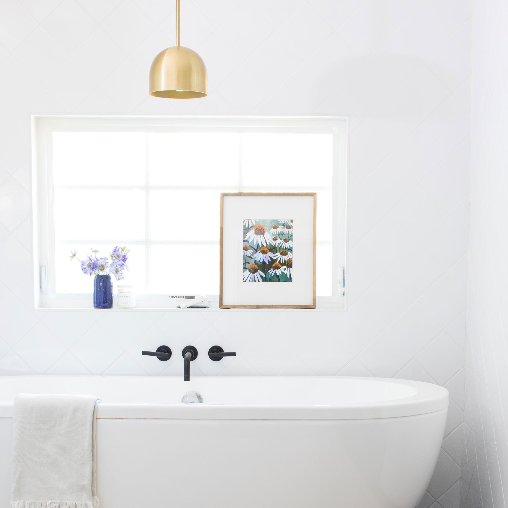 Amélie Rod 8" shown in Brass. Interior Design by Jenny Komenda of Juniper Studio.