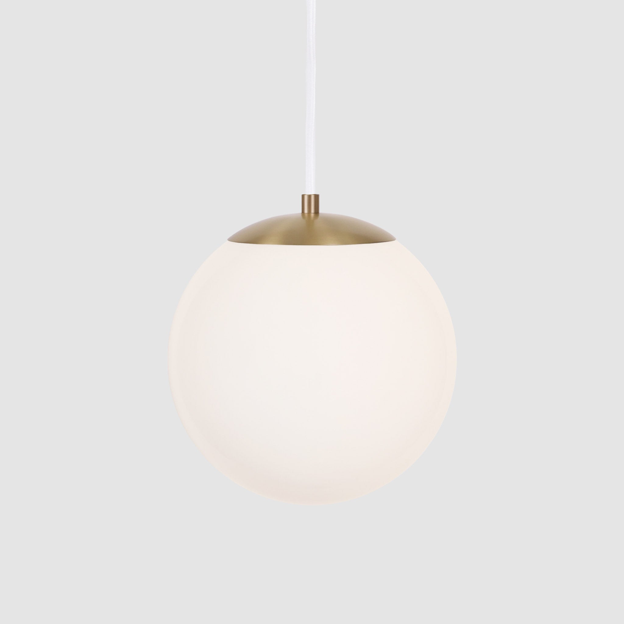 Alto Cord 8" shown in Brass with White Cloth Cord and an Opal 10” Globe