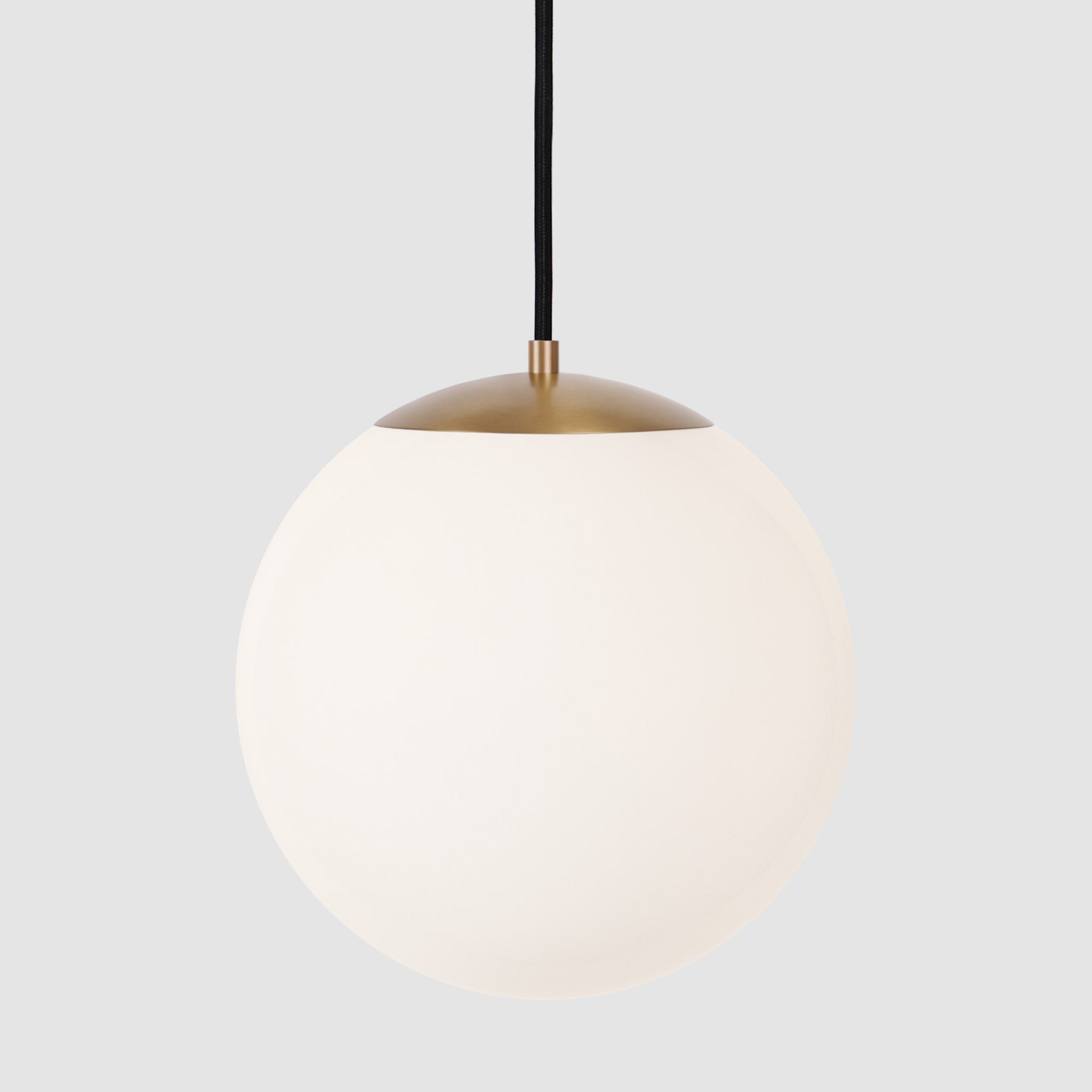 Alto Cord 12” shown in Heirloom Brass with Black Cloth Cord and an Opal 12” Globe