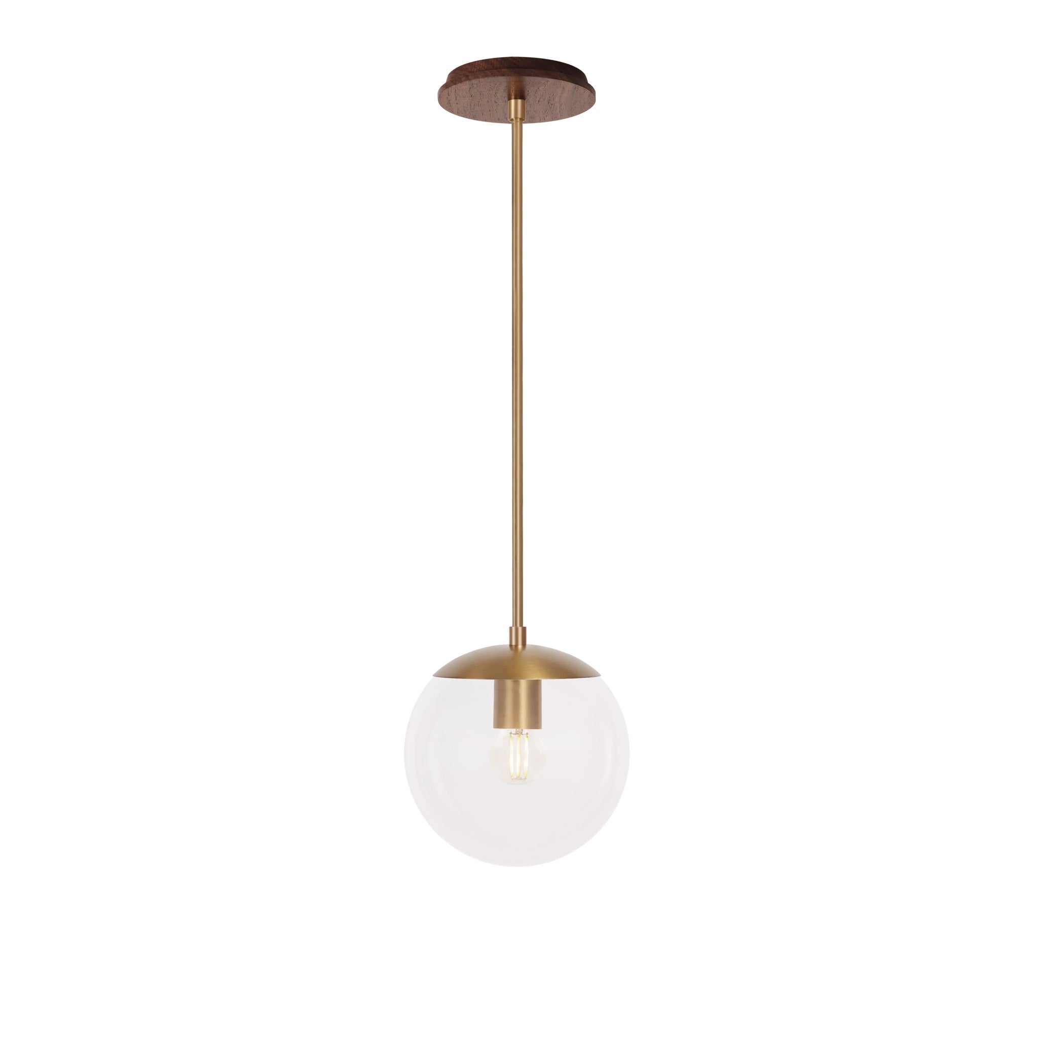 Alto Rod 8” Clear shown in Heirloom Brass with a Walnut Wood Canopy