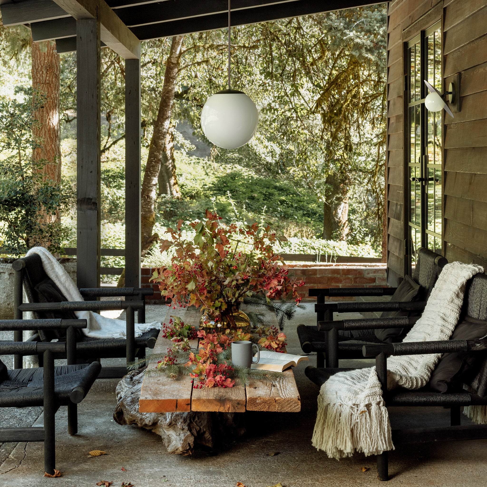 Marie Flush Sconce shown in Matte Black and an Alto Rod 12" in Matte Black with Opal globe