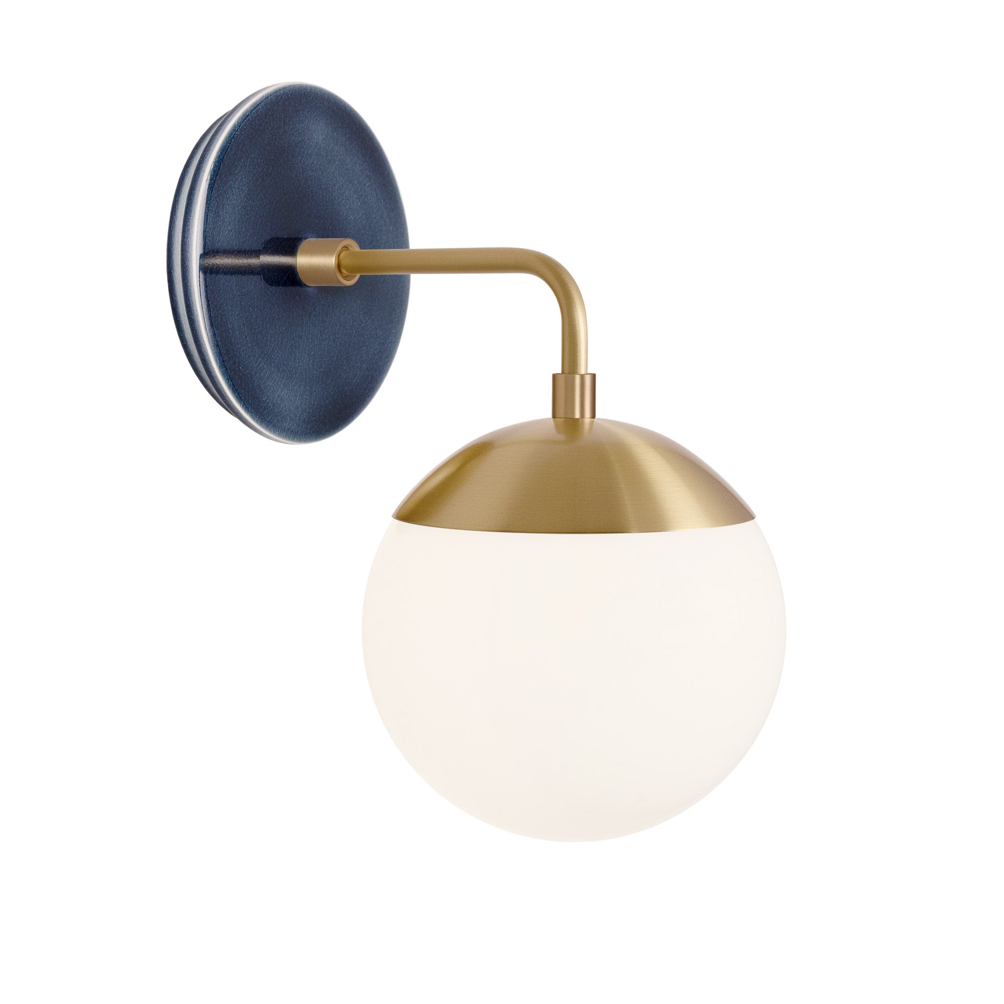 Alto Sconce 6” shown in Brass with an Indigo Blue Swift Ceramic Canopy