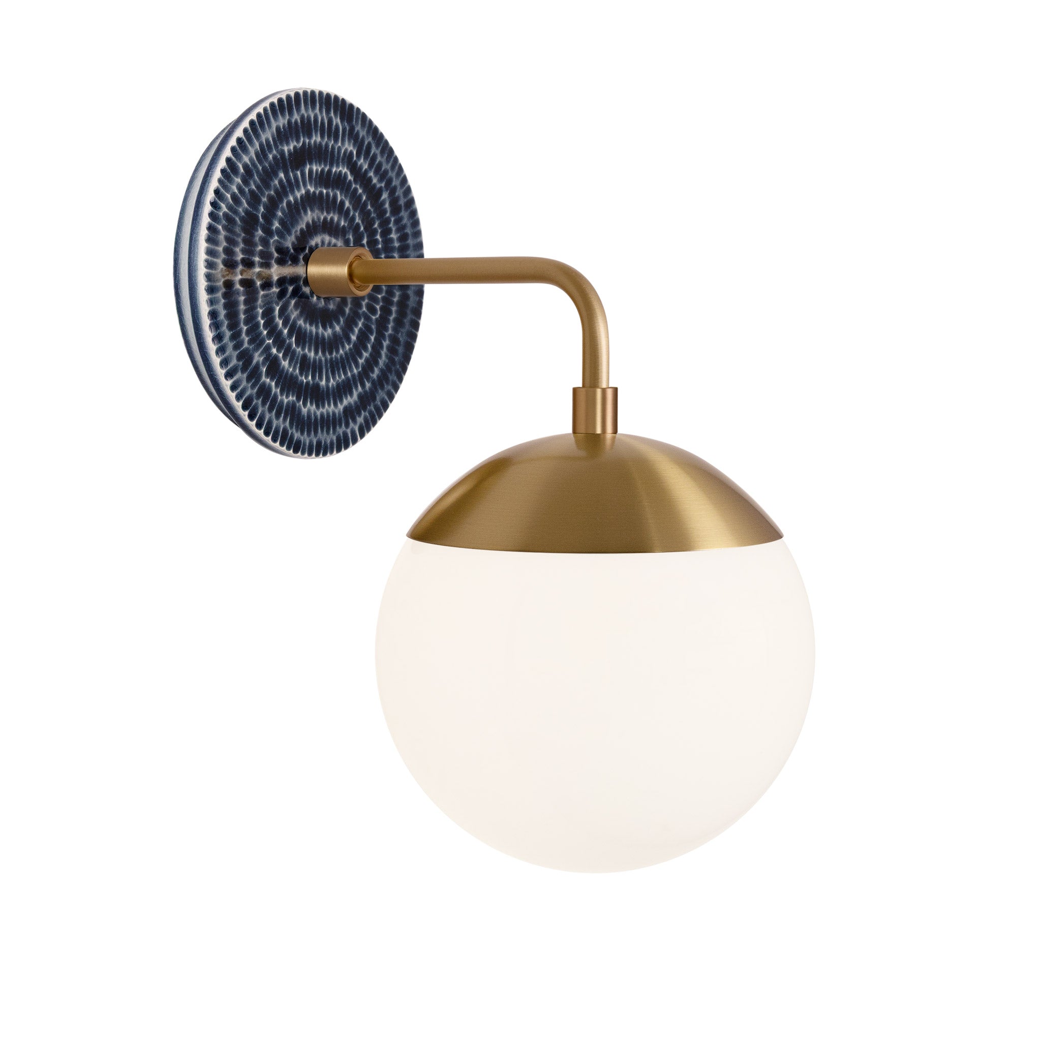 Alto Sconce 6” shown in Heirloom Brass with an Indigo Blue Sunflower Ceramic Canopy