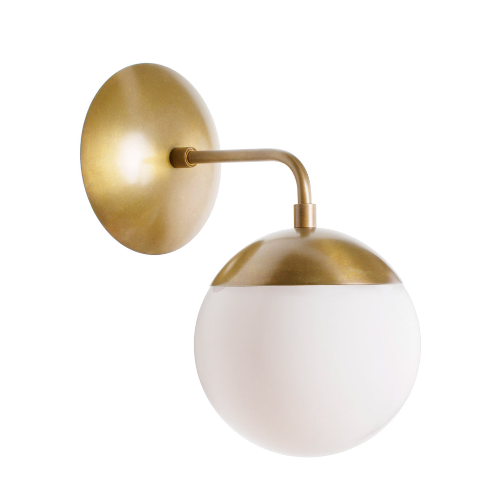 Alto Sconce 6" shown in Heirloom Brass with an Opal 6" globe