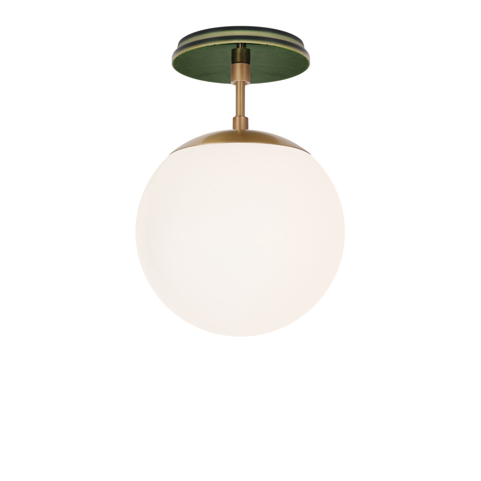 Alto Surface 8" shown in Heirloom Brass with a Forest Green Star Ceramic Canopy