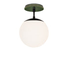 Alto Surface 8" shown in Matte Black with a Forest Green Star Ceramic Canopy