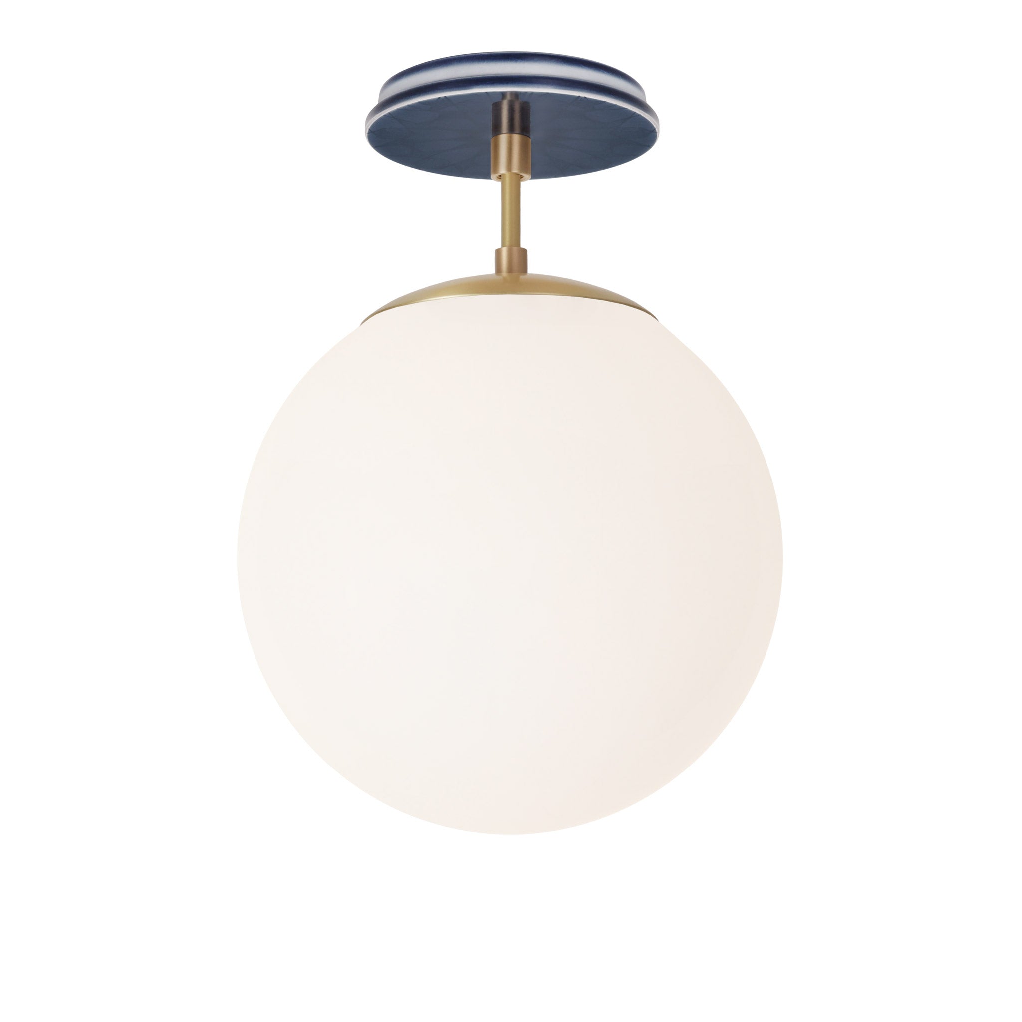 Alto Surface 10” shown in Brass with an Indigo Blue Star Ceramic Canopy