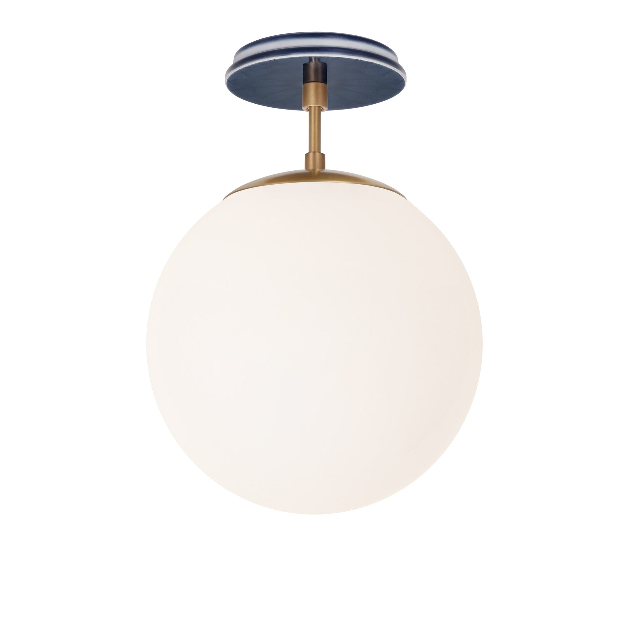 Alto Surface 10” shown in Heirloom Brass with an Indigo Blue Star Ceramic Canopy